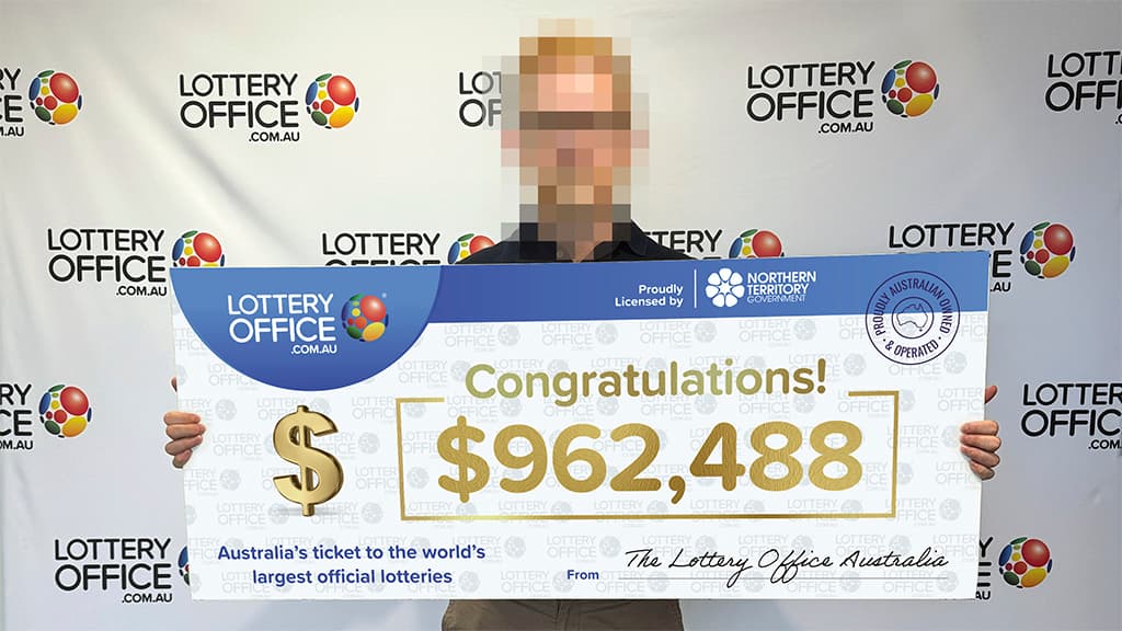 Man holding cheque.
